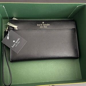 kate spade black leather wristlet with gold logo